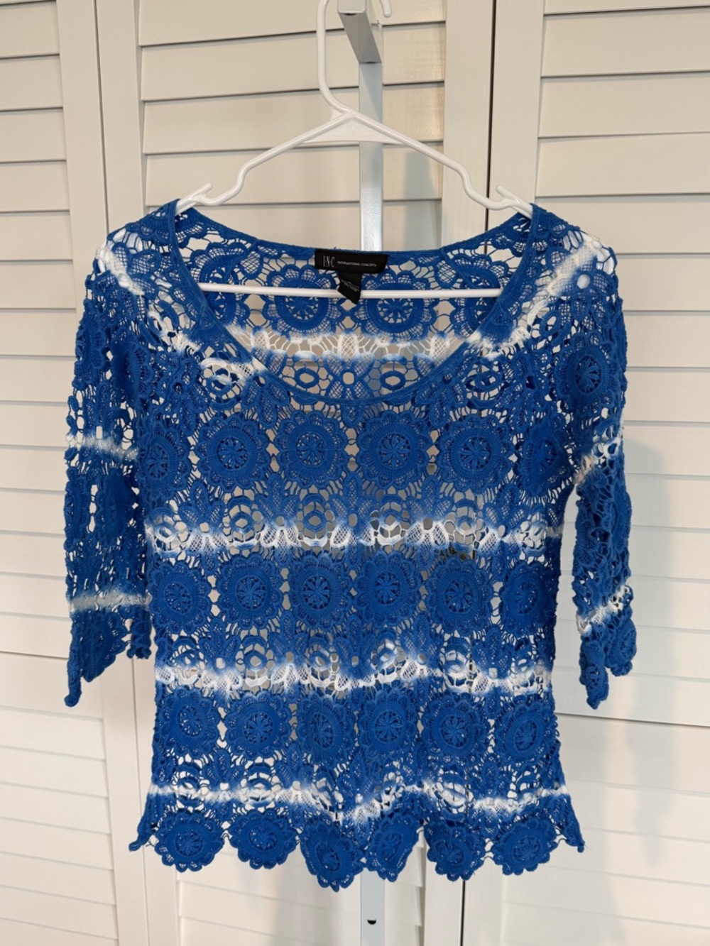 INC crochet top with 3/4 lengths sleeves. In excellent condition.